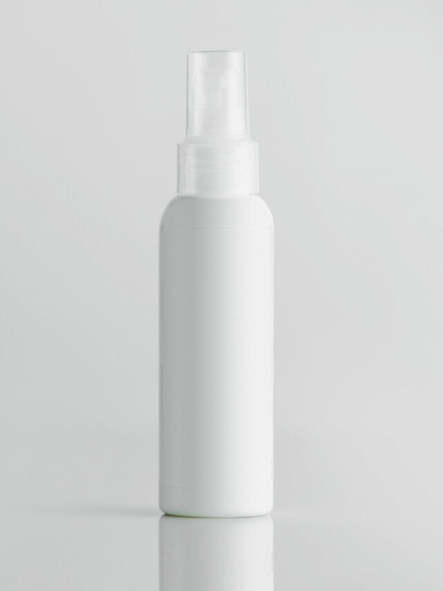 front view white plastic bottle with sprayer on a white background