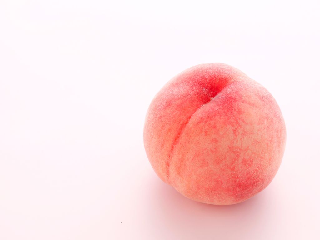 pêssego representando ânus