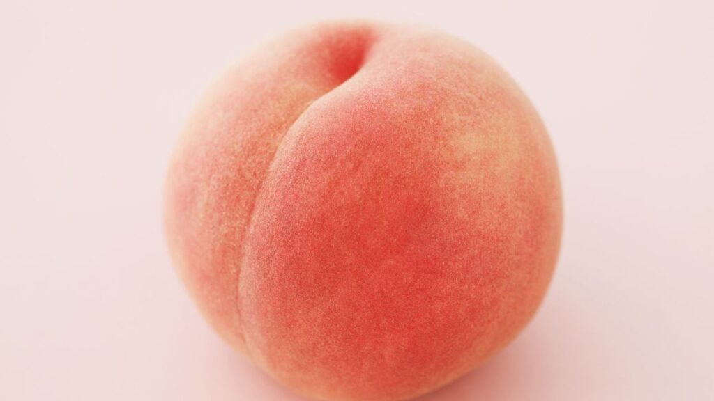 pêssego representando ânus